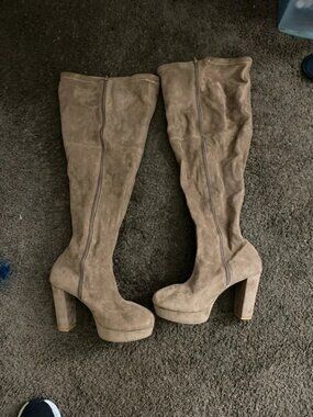 Knee length high heel boots